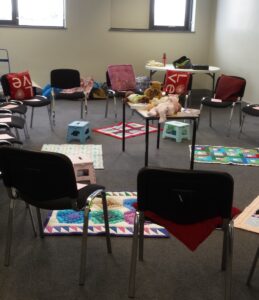 room full of chairs waiting for mums , babies and breastfeeding supporters