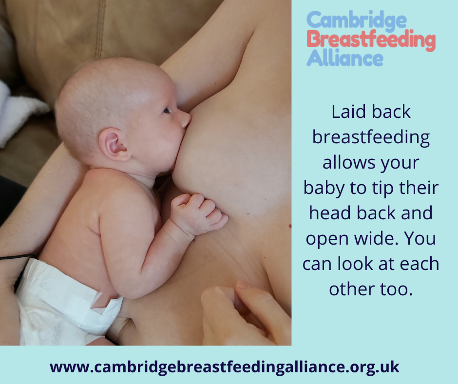 Baby feeding in laid back position, looking up at her mother. Text: Laid back breastfeeding allows your baby to tip their head back and open wide. You can look at each other too.